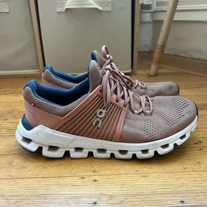 On cloud pink running shoes